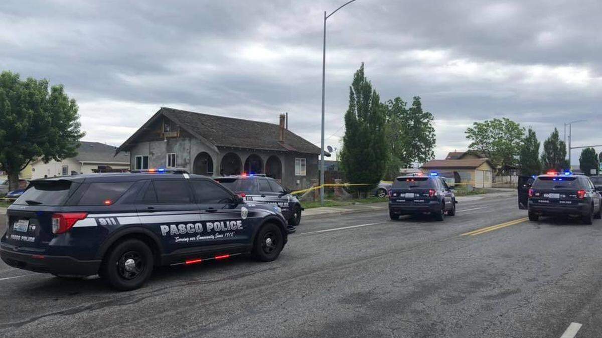 Two people were shot and wounded Sunday morning at the same Pasco house where a man was killed and two others wounded 2 1/2 weeks ago.