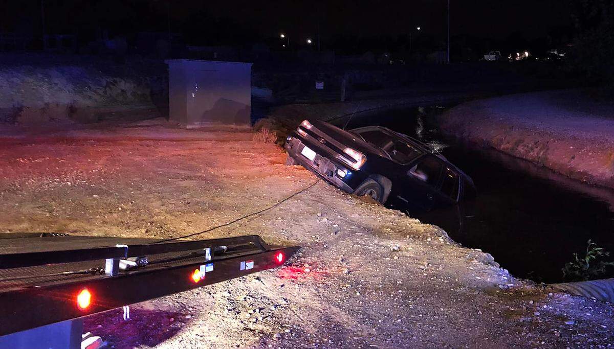 A pickup truck was half submerged in an irrigation canal in Kennewick late Monday.