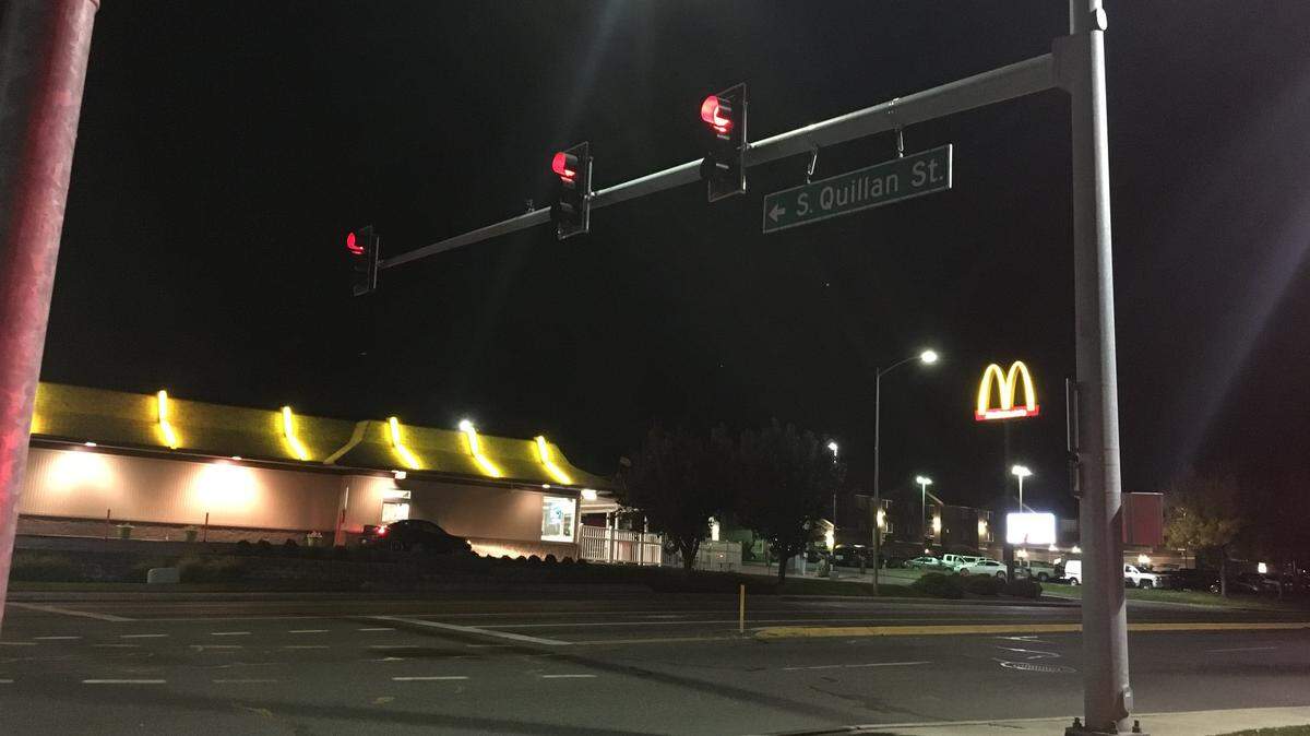 Kennewick police are hunting for the driver that hurt a motorcycle rider and then drove away Tuesday night.