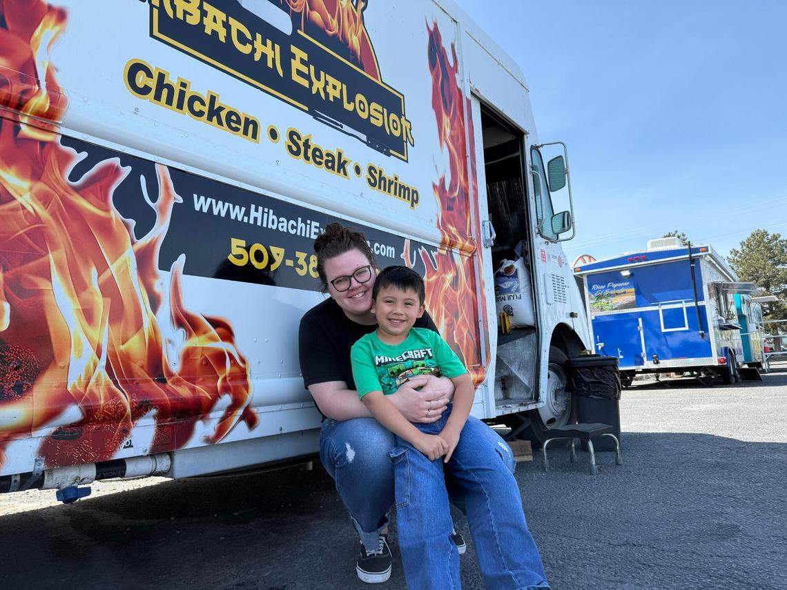 Gabrielle Cerdio and her son, Colter, 5, pose in front of Hibachi Explosion, a Kennewick food truck. Immigration officials took Cerdio’s husband, Sergio Cerdio Garcia, 42, into custody April 24, 2025, during a scheduled interview in Yakima.