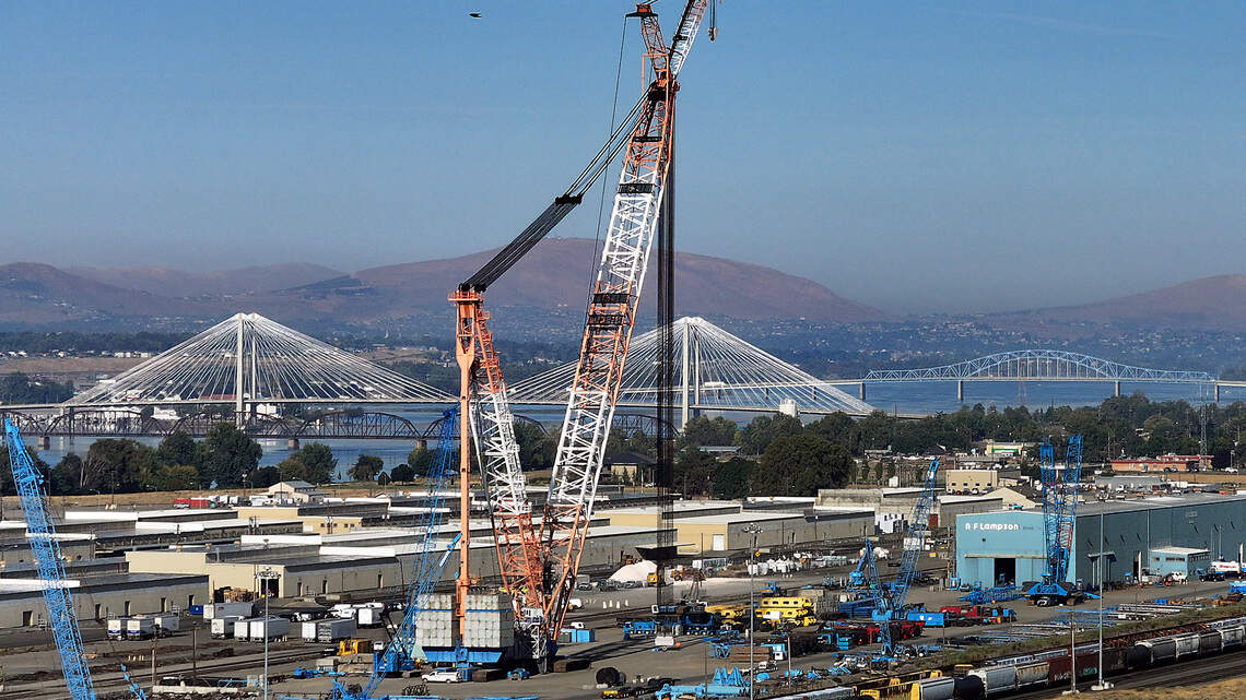 What happened to the monster crane that towered over Tri-Cities for 15 years?