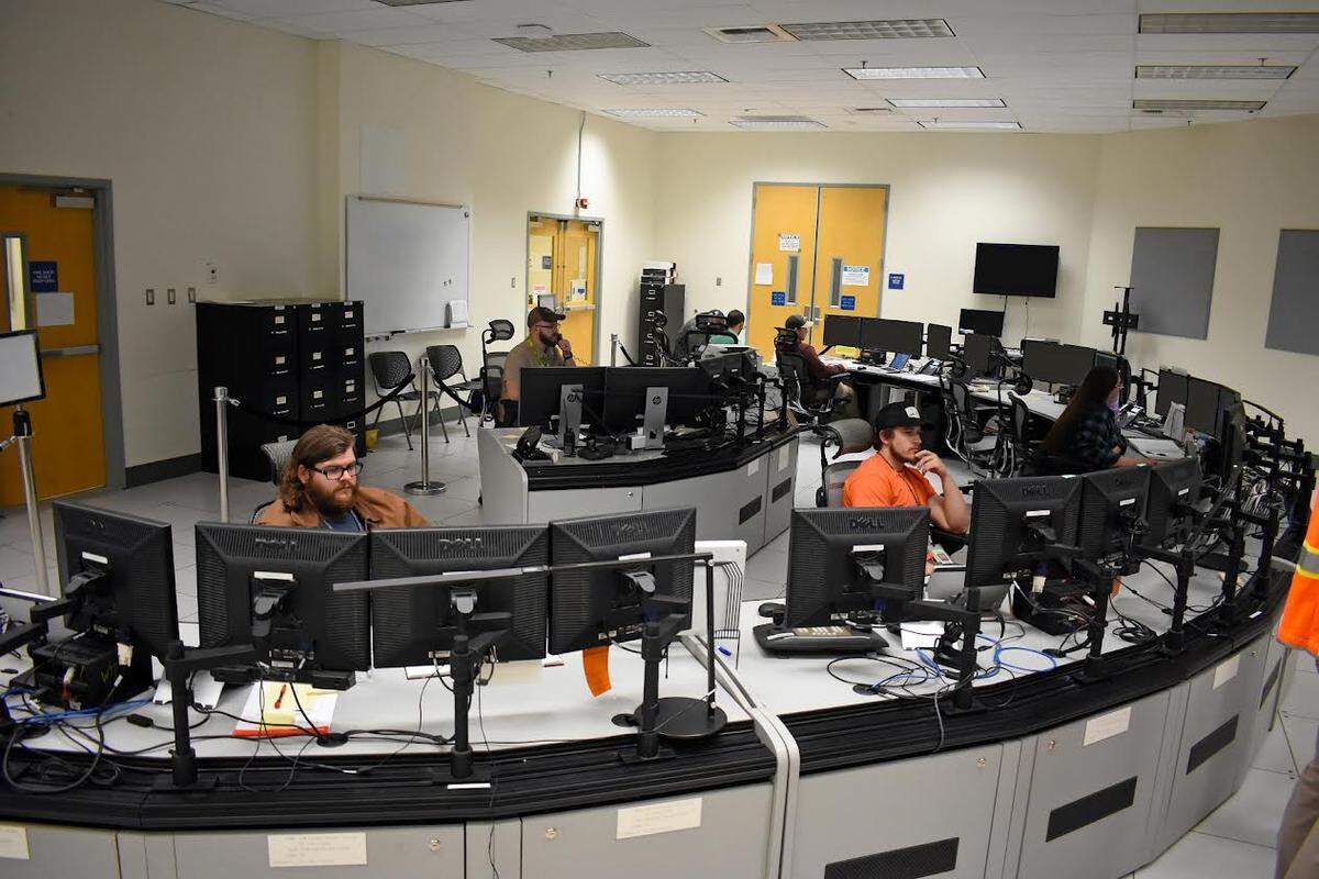 Commissioning technicians and a control room supervisor monitor and manage equipment and systems before melter heatup from the control room inside the Hanford vit plant’s Low Activity Waste Facility.