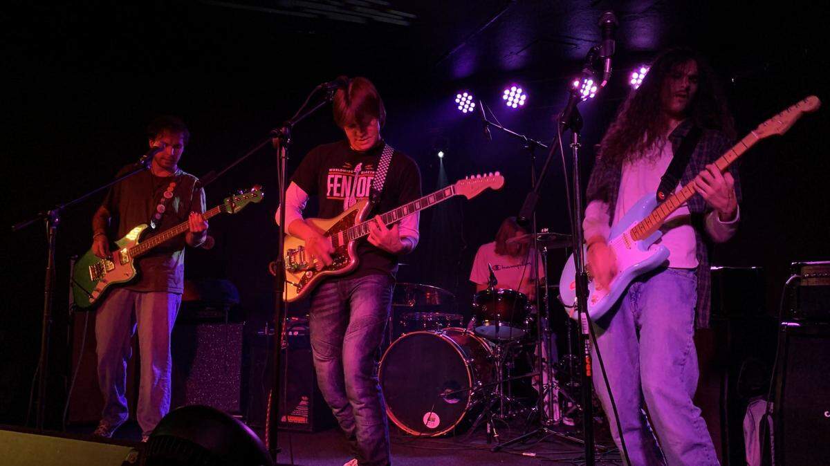 easyday, consisting of Griffin Durham (left), Chase Krank (center), James Bruce (back) and Luke Vesely (right), jams out on stage at Ray’s Golden Lion. 