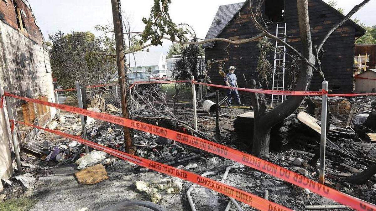 It’s been nearly a year since this house burned in central Kennewick. One neighbor says that’s far too long to wait for a cleanup.