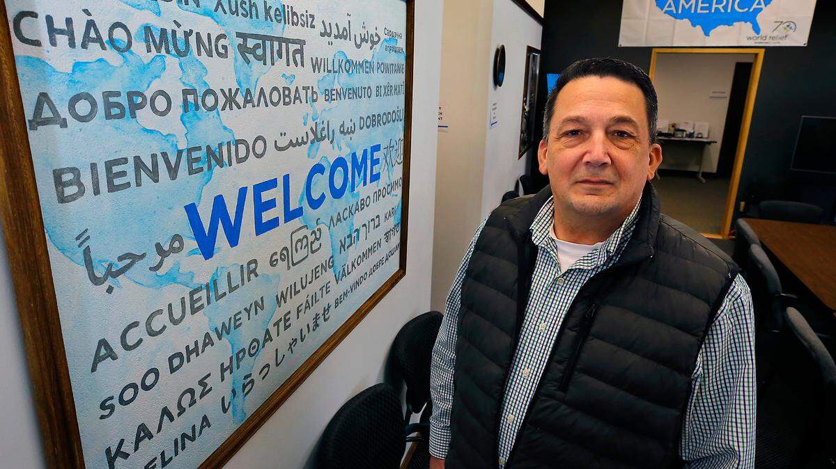 Ken Primus, director of World Relief Tri-Cities, stands in the organization’s Richland offices. It’s Southeast Washington’s only refugee resettlement agency, helping hundreds of legal refugees fleeing persecution, war or violence.