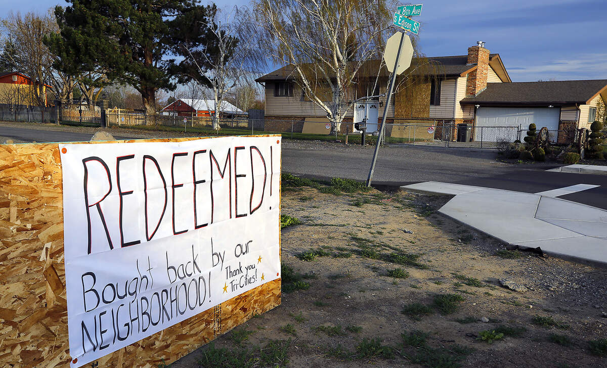 Neighbors in the area off West Eighth Avenue have placed a sign along Edison Street in Kennewick after thwarting plans for a home for sex offenders.