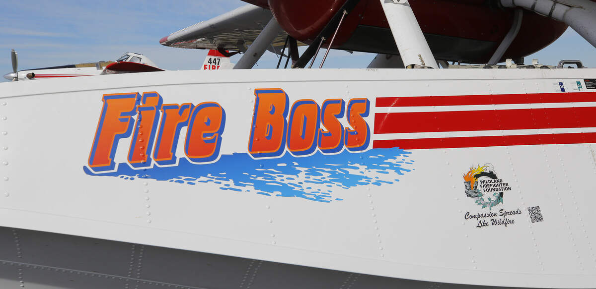 Stickers are affixed to the float of the Air Tractor single engine air tanker currently stationed during wildfire season at the Port of Benton's Richland Airport.