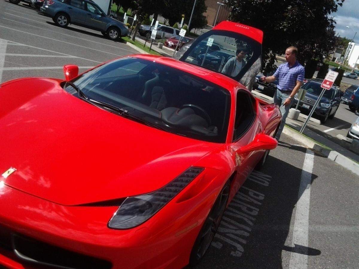 In this 2014 file photo, Mark Wondrack shows his Ferrari to a young cancer patient in Richland.