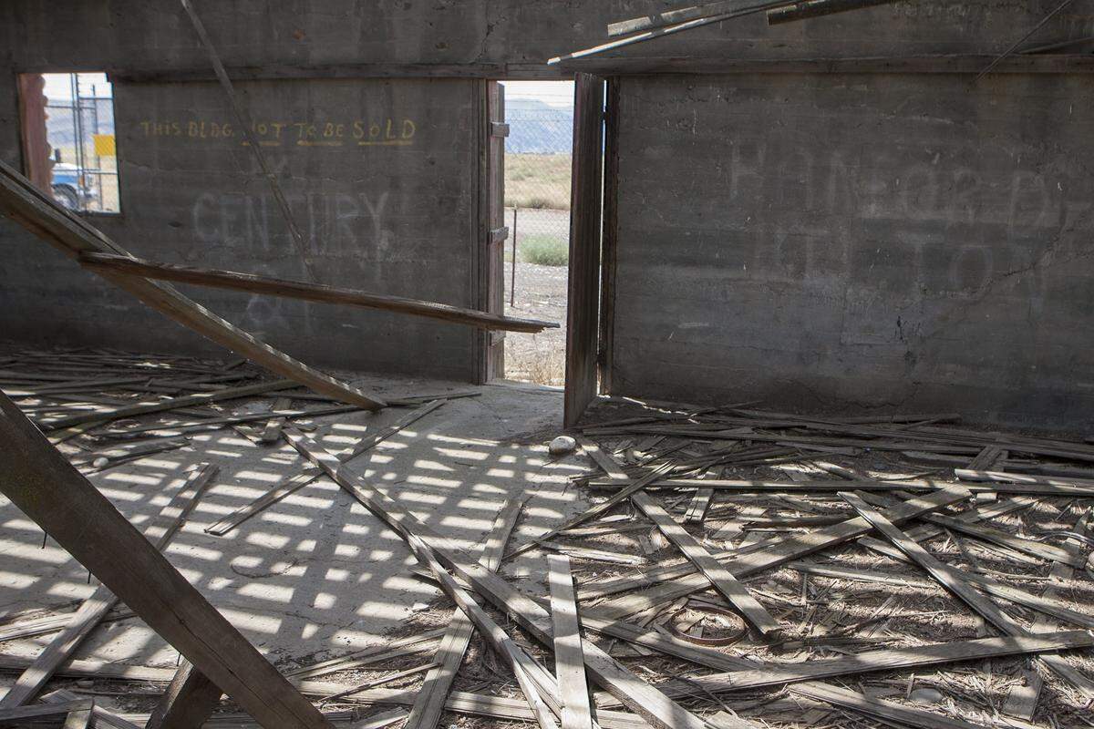 Pieces of roofing litter the inside of the Bruggemann Warehouse at the Manhattan Project National Historic Park.