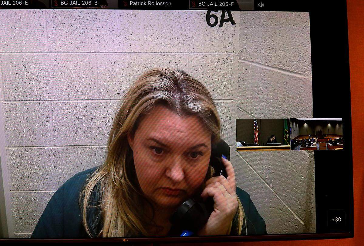 Vet tech Kristina Ripplinger, 43,  makes her preliminary appearance via a video link in Benton County Superior Court in Kennewick in April 2023 for allegedly embezzling from the pet clinic where she worked.