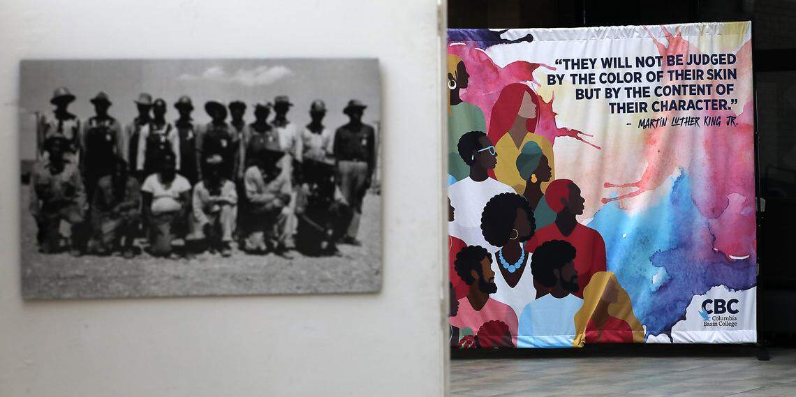 A colorful backdrop and a series of historic Hanford photos are on display in the atrium of the H bulding for the annual Martin Luther King Jr. Bell Ringing Ceremony on the Pasco campus.