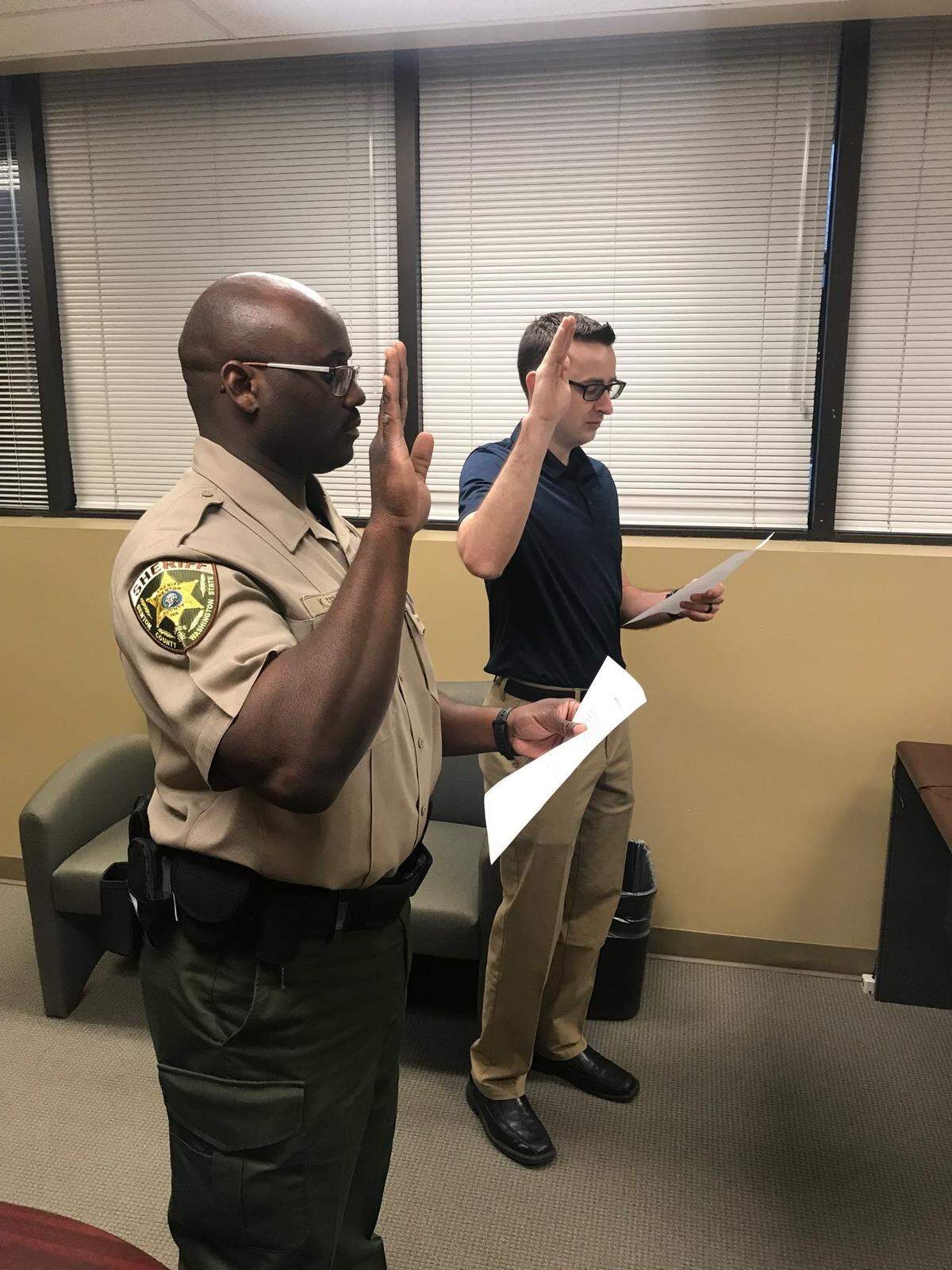 Benton County Corrections Officer Kevin Bell, left, was sworn in nearly five years ago. He was arrested on Tuesday, March 5, for alleged sexual misconduct.