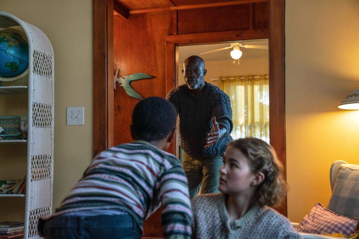 Man on Island (Djimon Hounsou) and Regan (Millicent Simmonds) brave the unknown in “A Quiet Place Part II.”