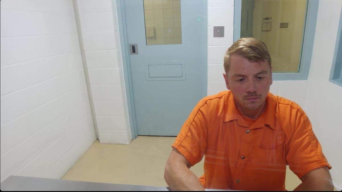 Kennewick police detective is being held in the Franklin County jail on investigation of assault.