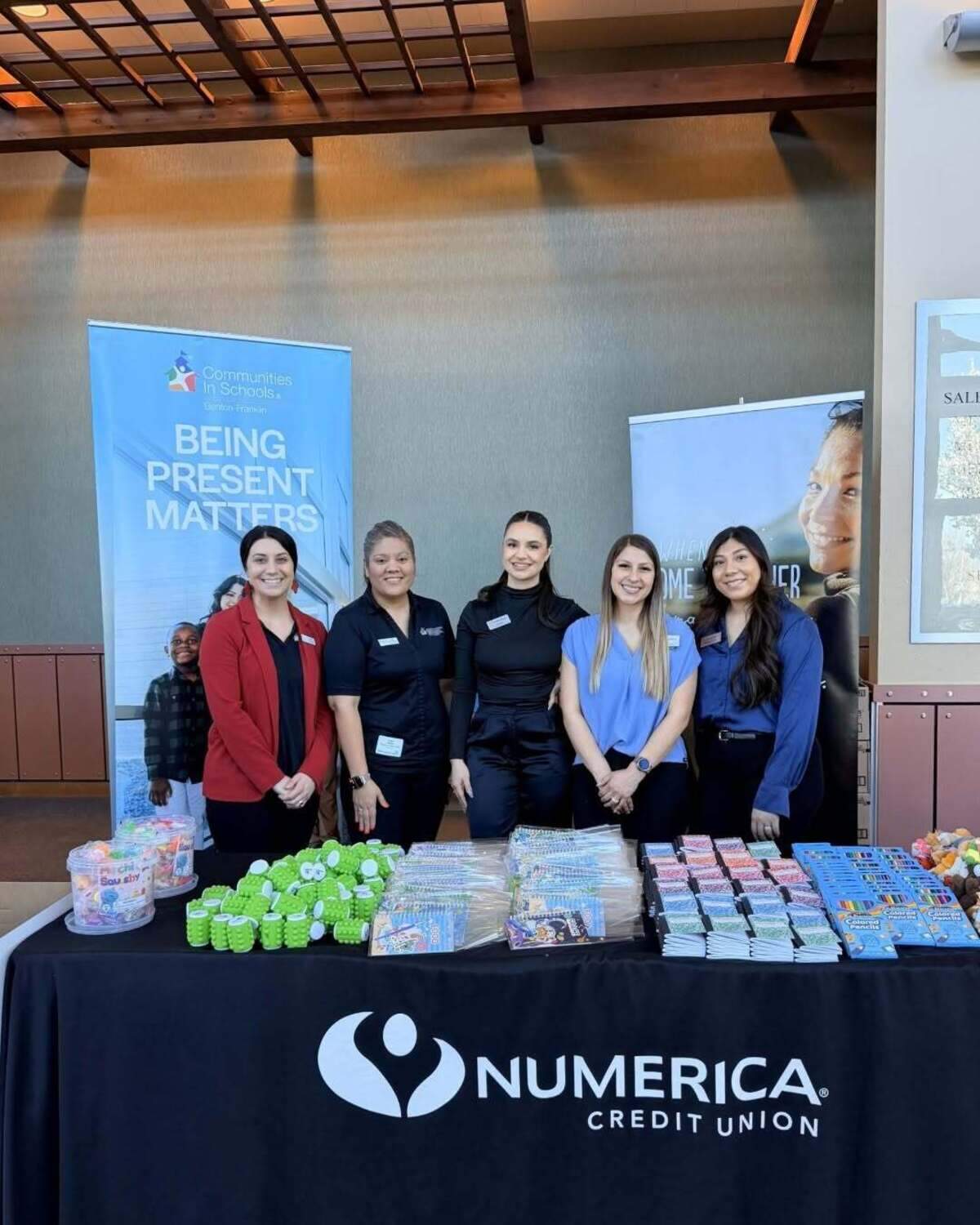 Members from Communities In Schools Benton-Franklin worked to pack spring break care kits for children at Numerica’s activity table during the Tri-City Regional Chamber Annual Meeting and Awards Luncheon event.