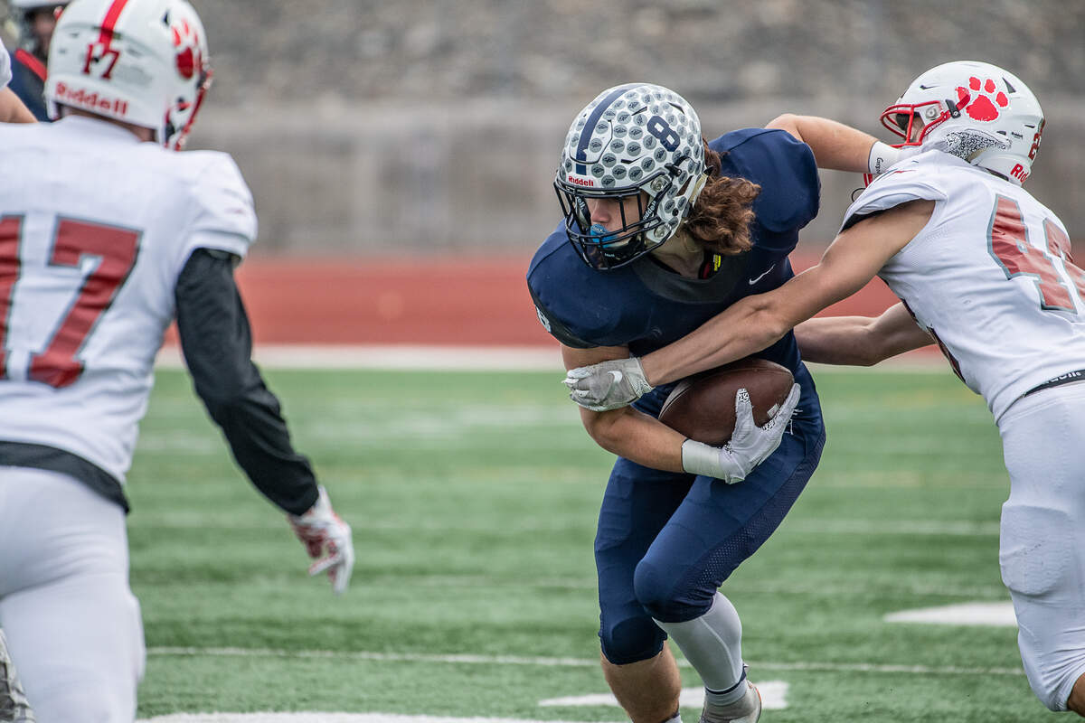 Chiawana TE Bridger Feldmann (8) goes one-on-one against a Mt Si defender