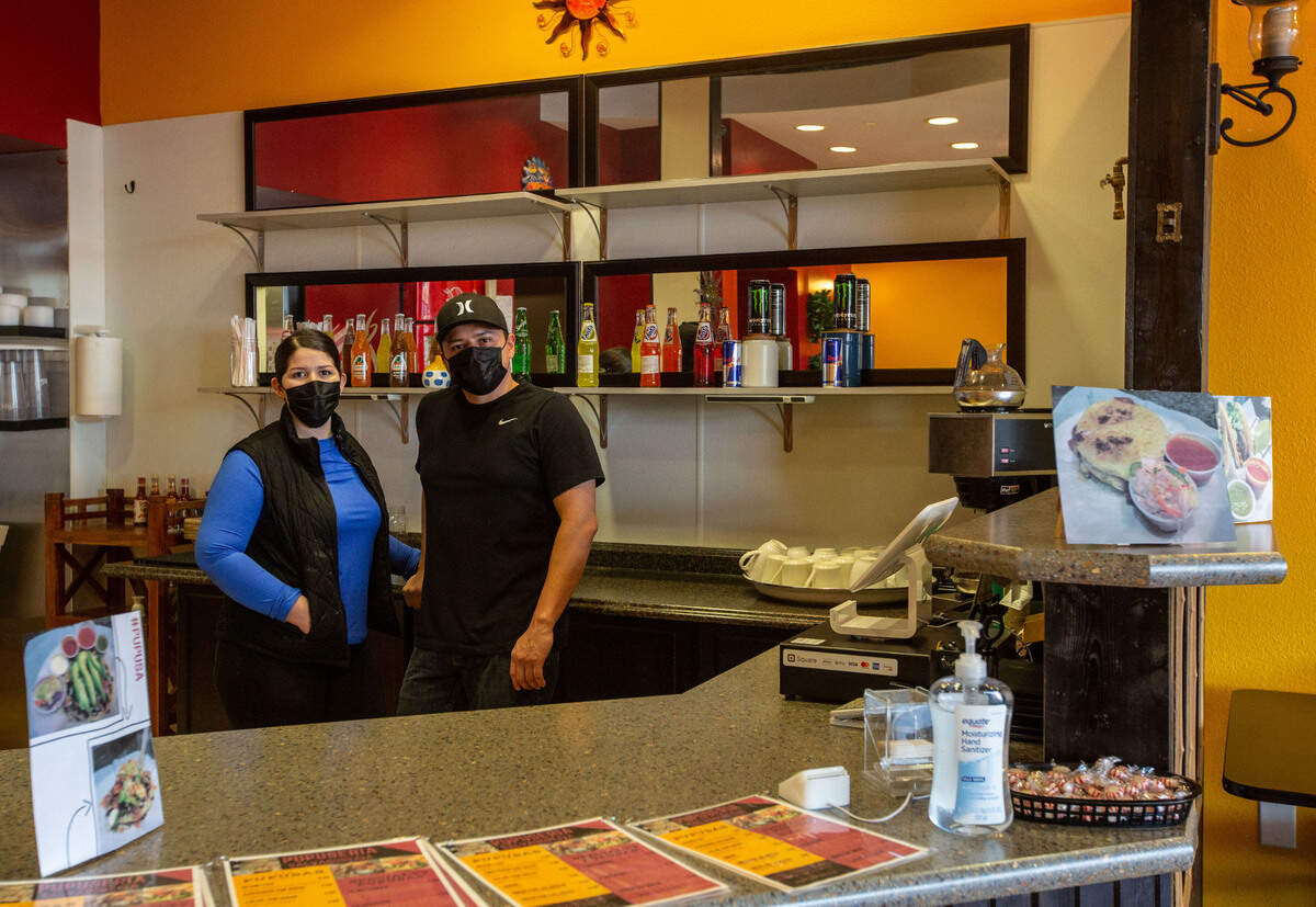 Pupuseria Salvadoreña owners Iliana Amaya and Jimmy Coronel stand behind the counter of their new restaurant in Richland. The couple is bringing Central American dishes to the Tri-Cities.