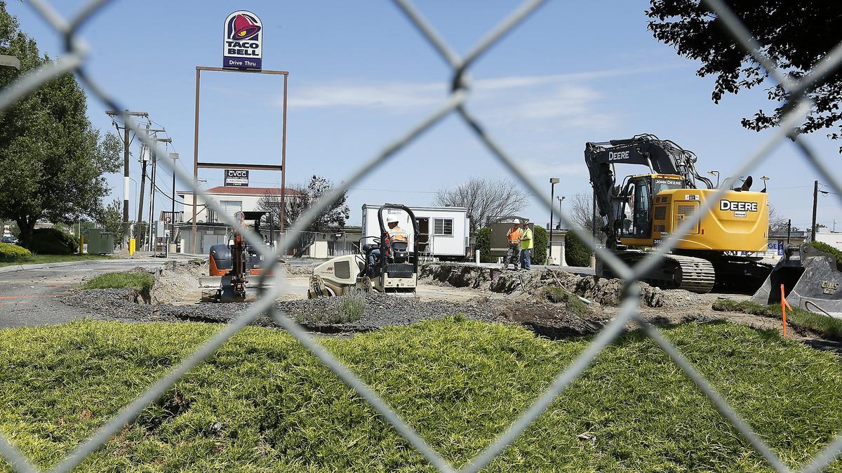 
Construction workers have started preparing the Taco Bell restaurant site for a new building at the corner of West Kennewick Avenue and Highway 395 in Kennewick. The fast food restaurant was recently razed and construction fence placed around the work zone.
