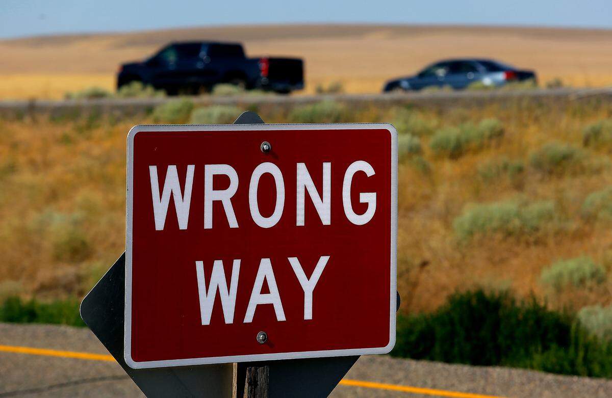 Wrong way freeway sign at interchange for Interstate 82 south of Kennewick.
