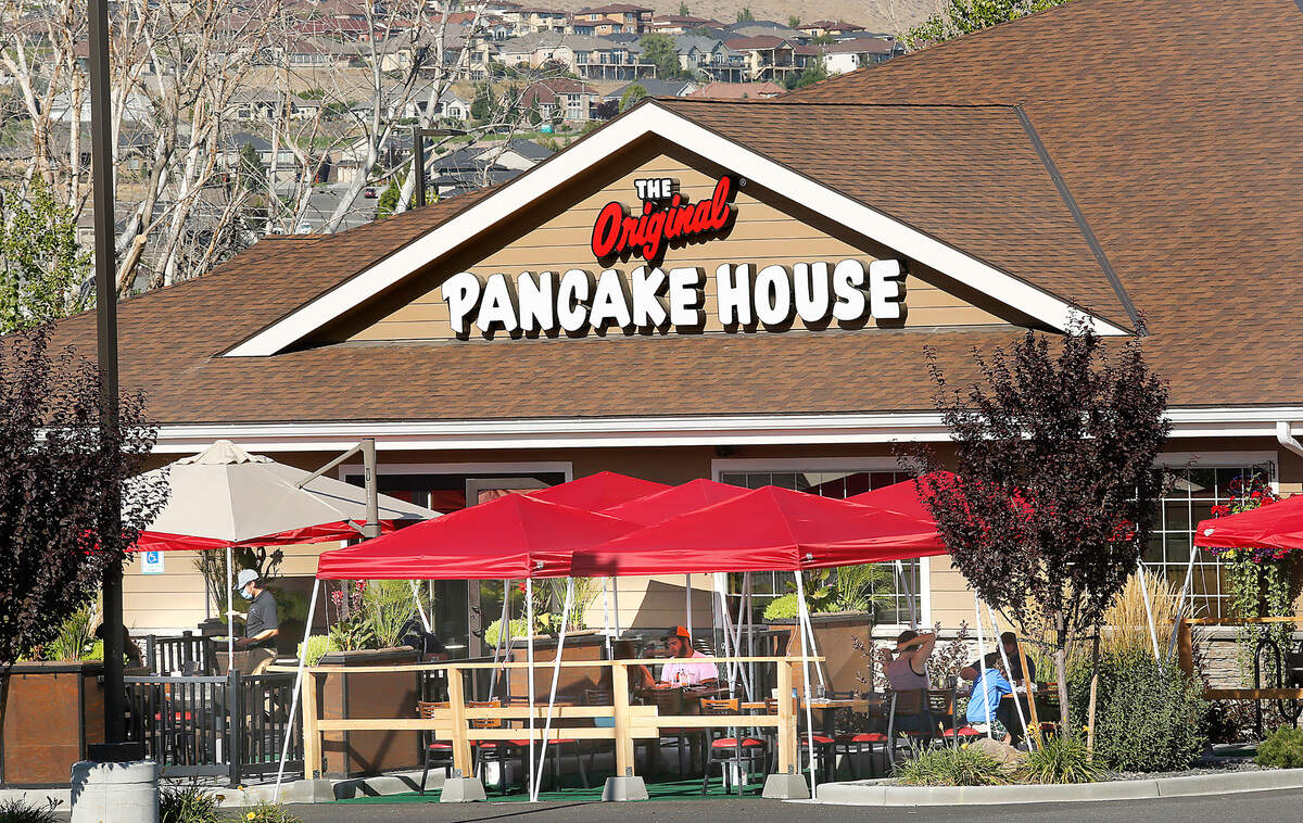 Diners at the Original Pancake House sit at the restaurant’s outdoor dining area off Keene Road in south Richland. 