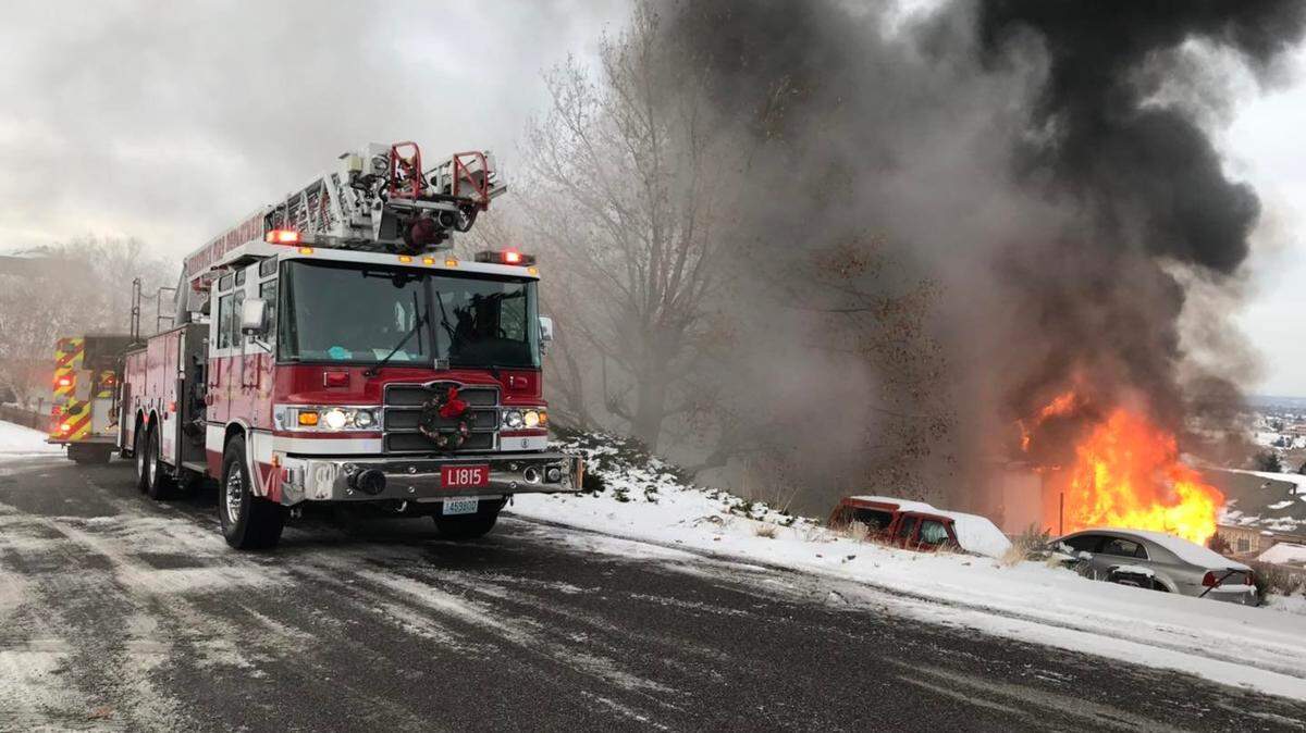 Kennewick fire crews battled a blaze at 4605 S. Ledbetter St. on Saturday.