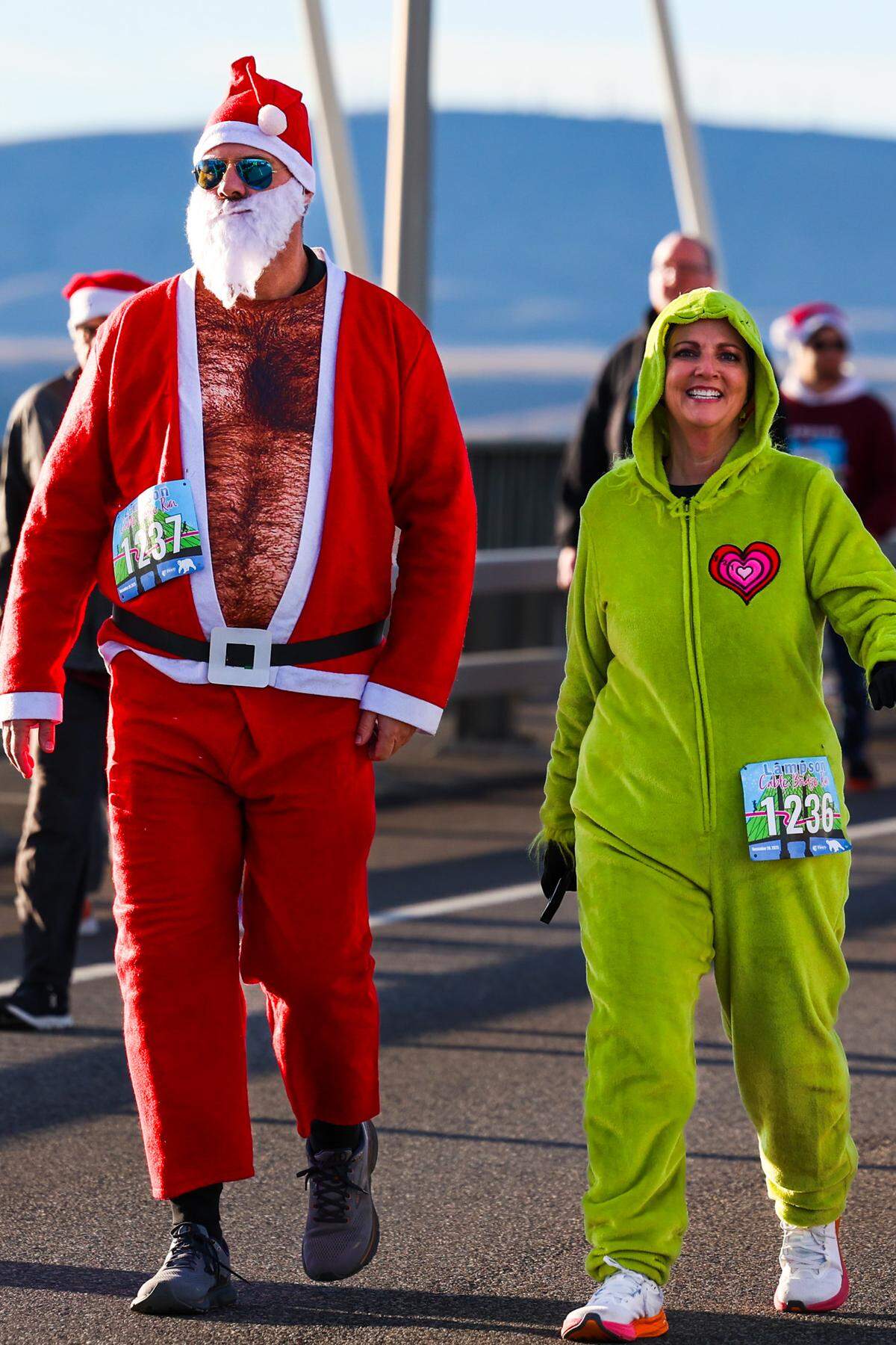 An estimated 2,300 runners and walkers hit the pavement Saturday morning for the 47th annual Lampson Cable Bridge Run in the Tri-Cities.