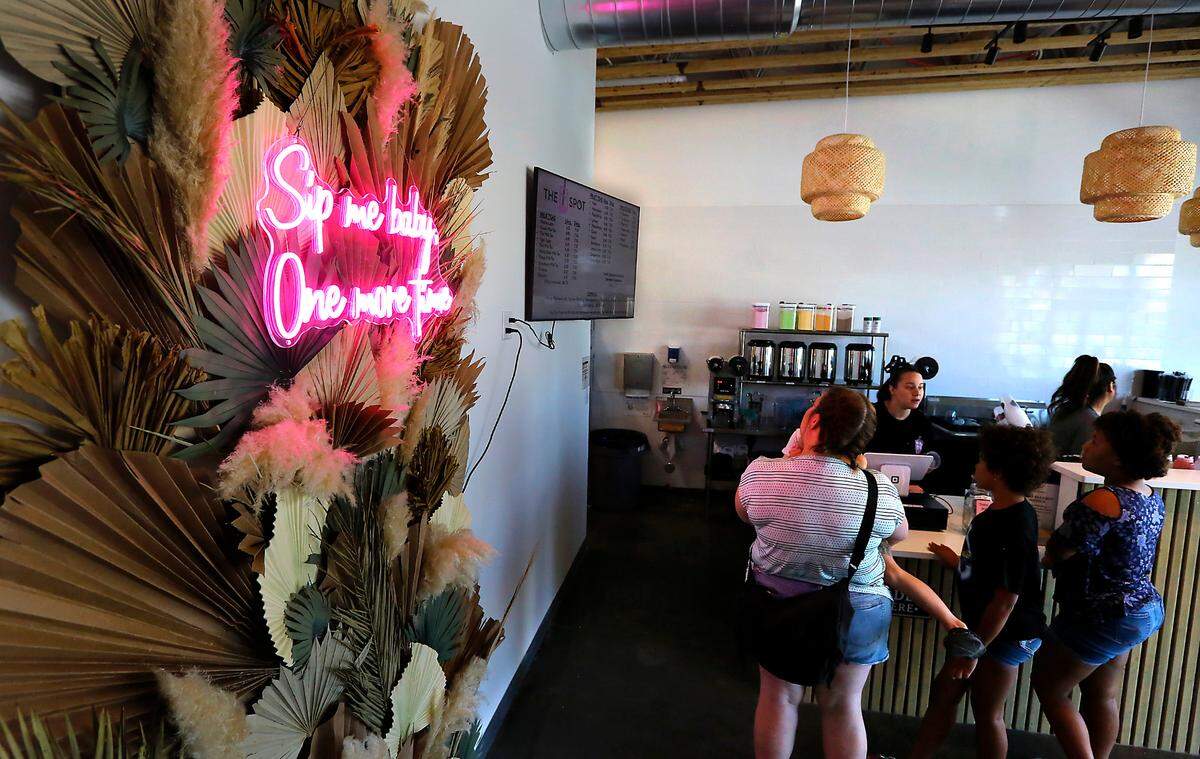 Bobarista Grace Porter helps customer with their drink order The B Spot Tea Bar in West Richland. Jessica and Ric Gonzalez opened the new business at 1523 B Bombing Range Road on Aug. 12.