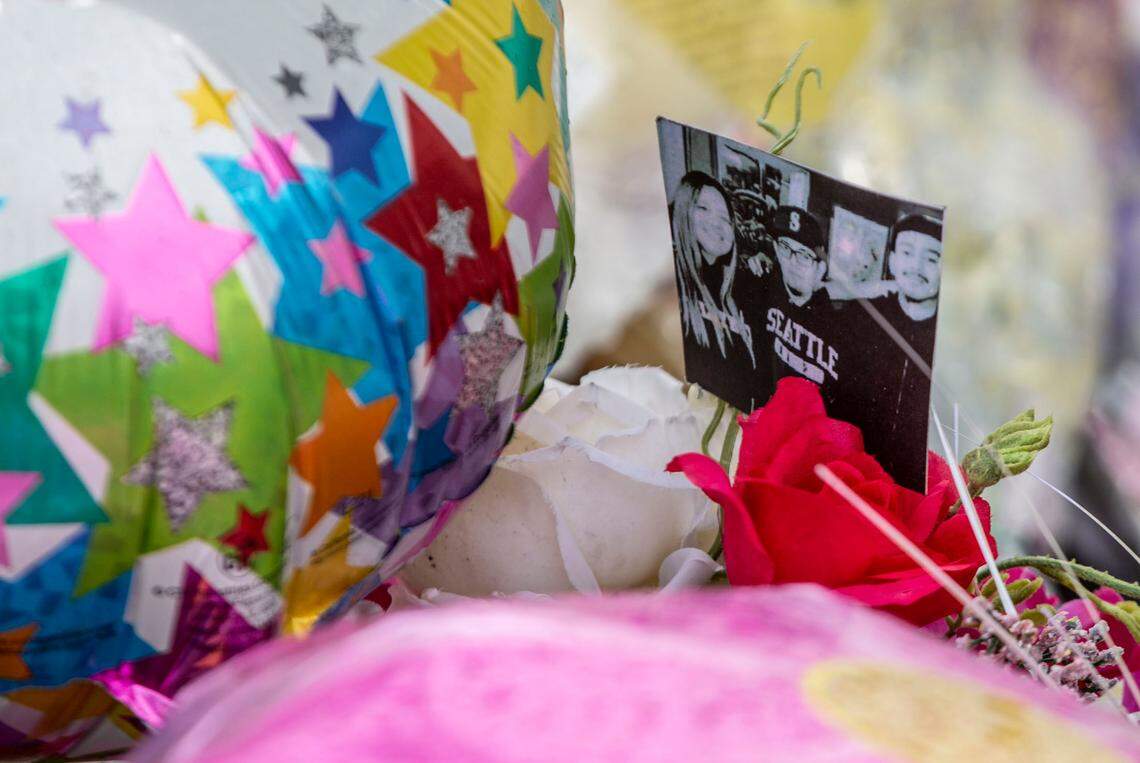 A picture of the three victims of a one-car crash that happened at the intersection of George Washington Way and Jadwin Avenue at 2:45 a.m. on Feb. 27 has been placed at a memorial that friends and family have erected at the scene of the accident.