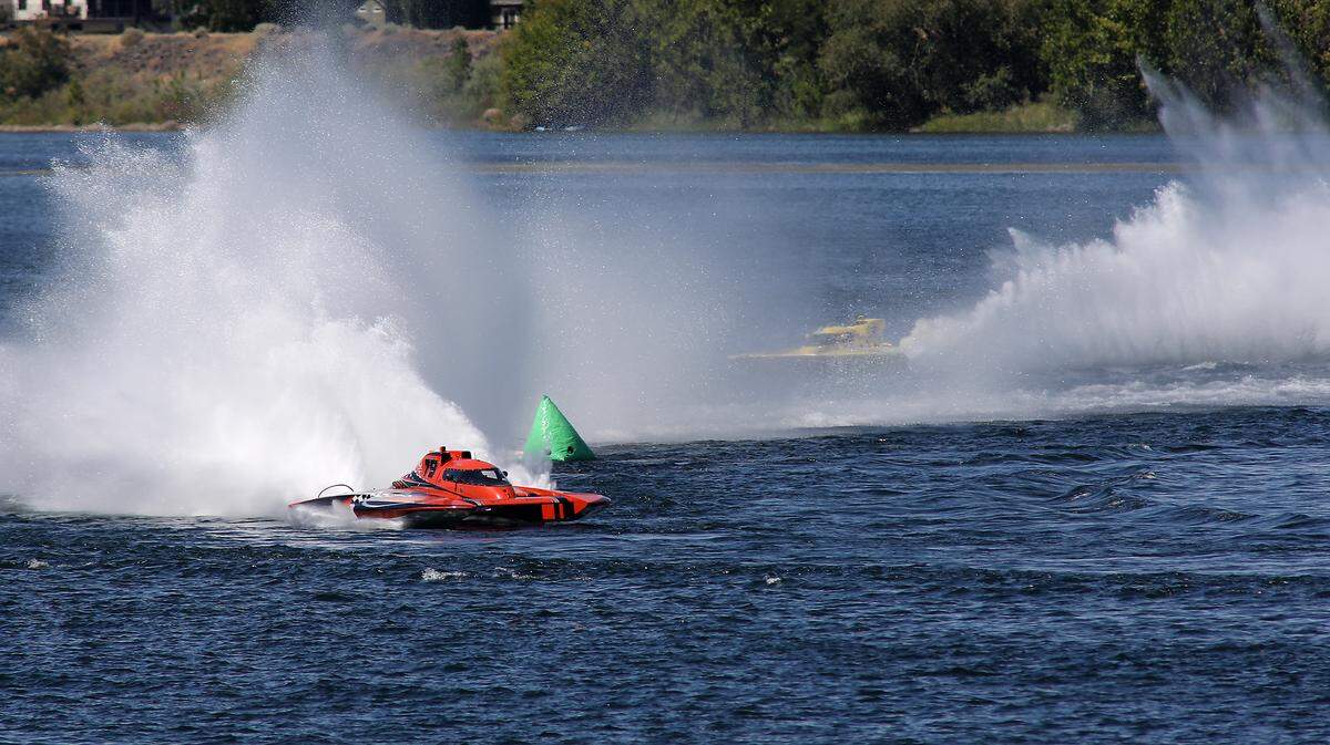Race driver Jeff Bernard in the GP-79 races to victory in heat one of the GPA racing Saturday on the Columbia River. Following him to the finish line in second place is Jerry Hopp in the GP-15.