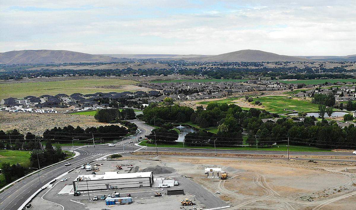 This drone photo shows the Kingsgate Way and Highway 240 near the Horn Rapids housing development in Richland