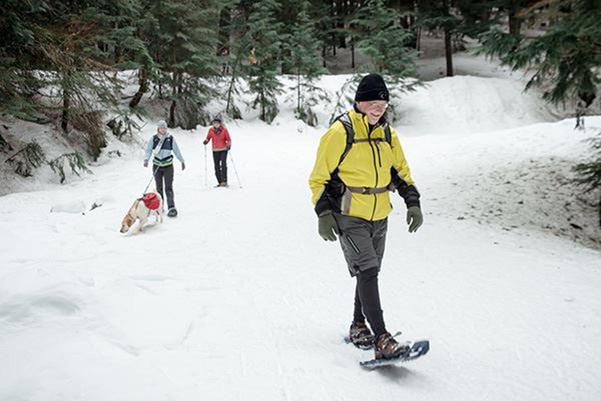 Visitors showshoe a trail at Mount Spokane State Park.