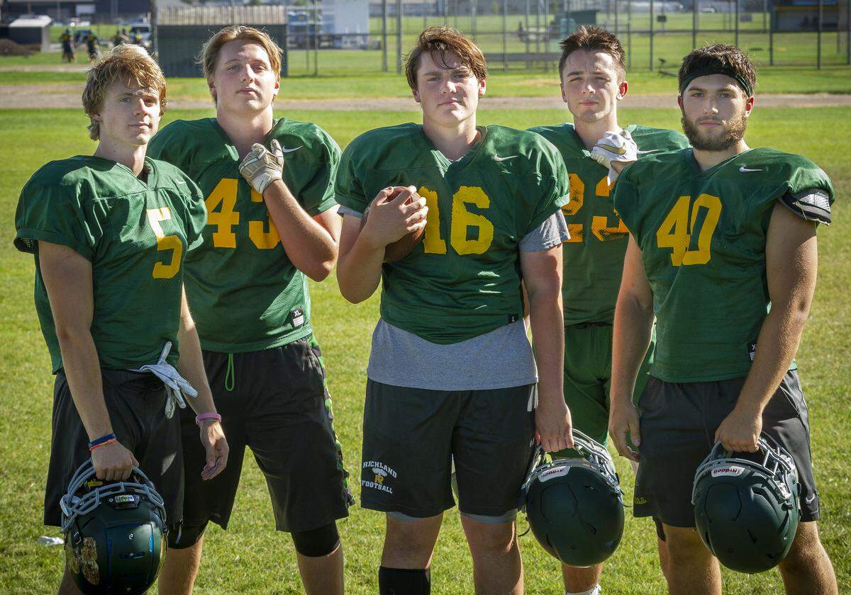 Richland’s Ben Fewel (5), left, Sam Stanfield (43), Harrison Westover (16), center, AJ Storms (23) and (40) Ryan Johnson.