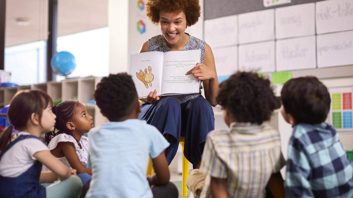 A teacher reading to students