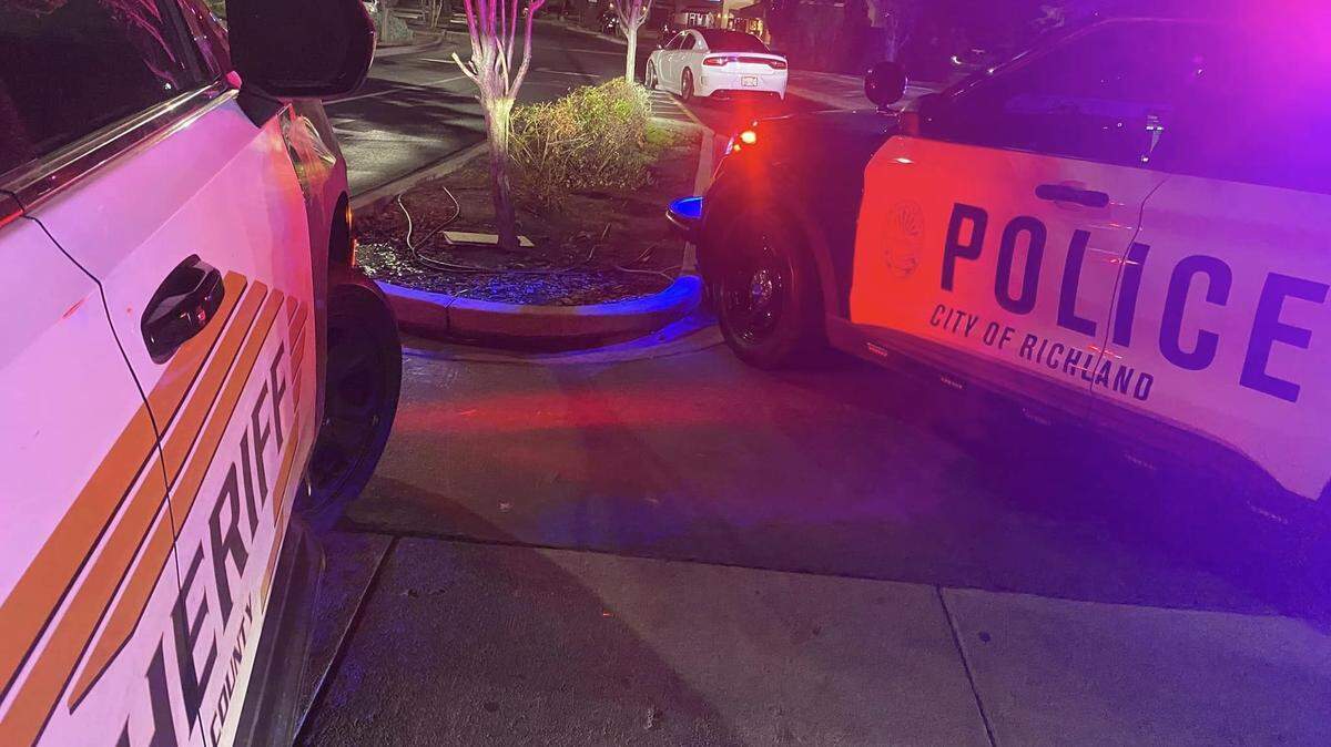 A disabled car was found in the Richland WinCo parking lot after its tires were punctured by police spike strips.