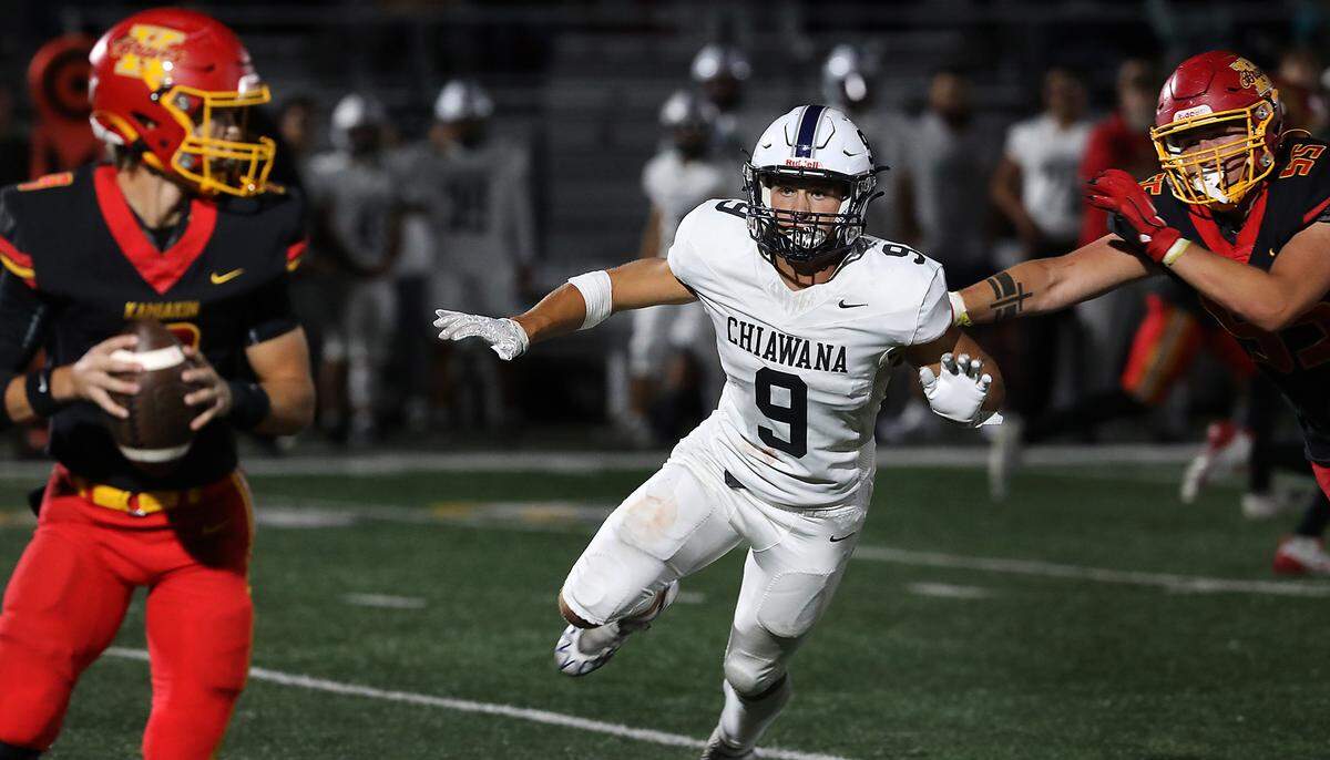 Chiawana linebacker Cooper MacPherson sets his sights on Kamiakin quarterback Trent Woodhouse during a Sept. 12, 2024 game at Lampson Stadium in Kennewick.