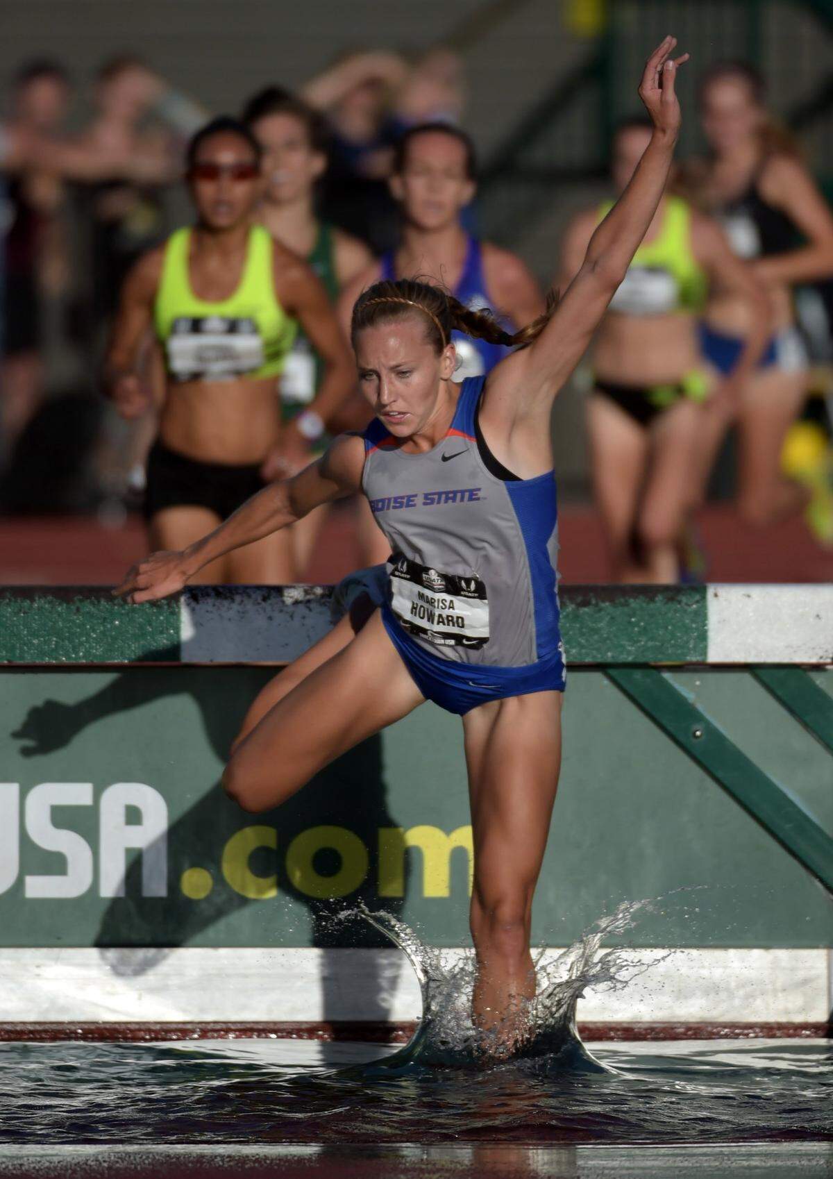 Jun 25, 2015; Eugene, OR, USA; Marisa Howard of Boise State falls in the water jump in the womens steeplechase in the 2015 USA Championships at  Hayward Field. Mandatory Credit: Kirby Lee-USA TODAY Sports