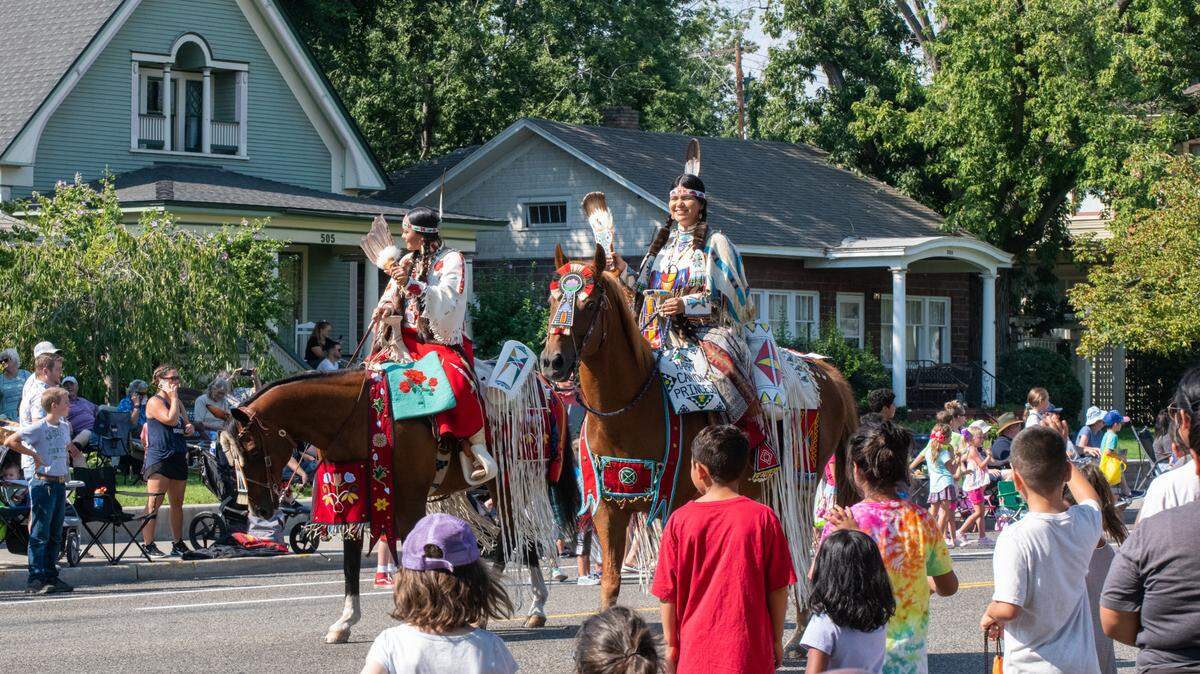 Thousands line the streets in downtown Kennewick to watch the annual parade.