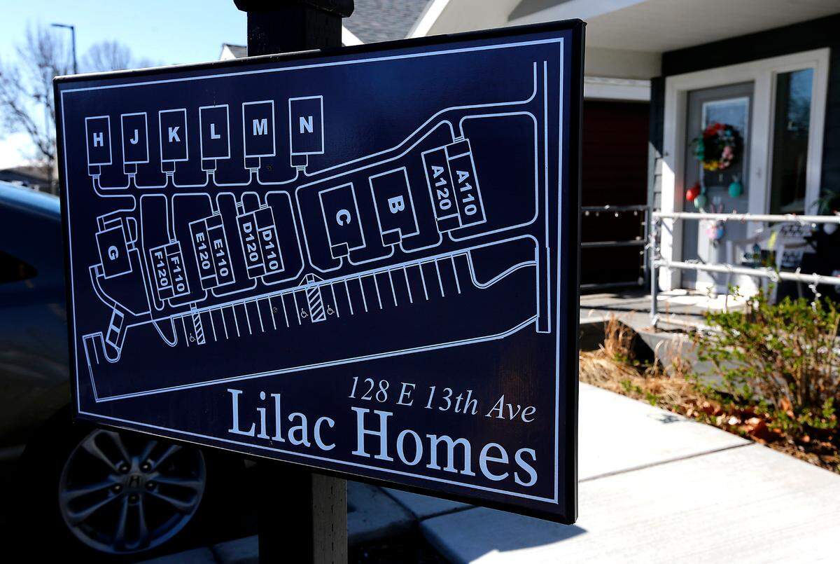 A sign posted at the Lilac Homes development on East 13th Avenue in Kennewick maps out the placement of units at the tiny house project..