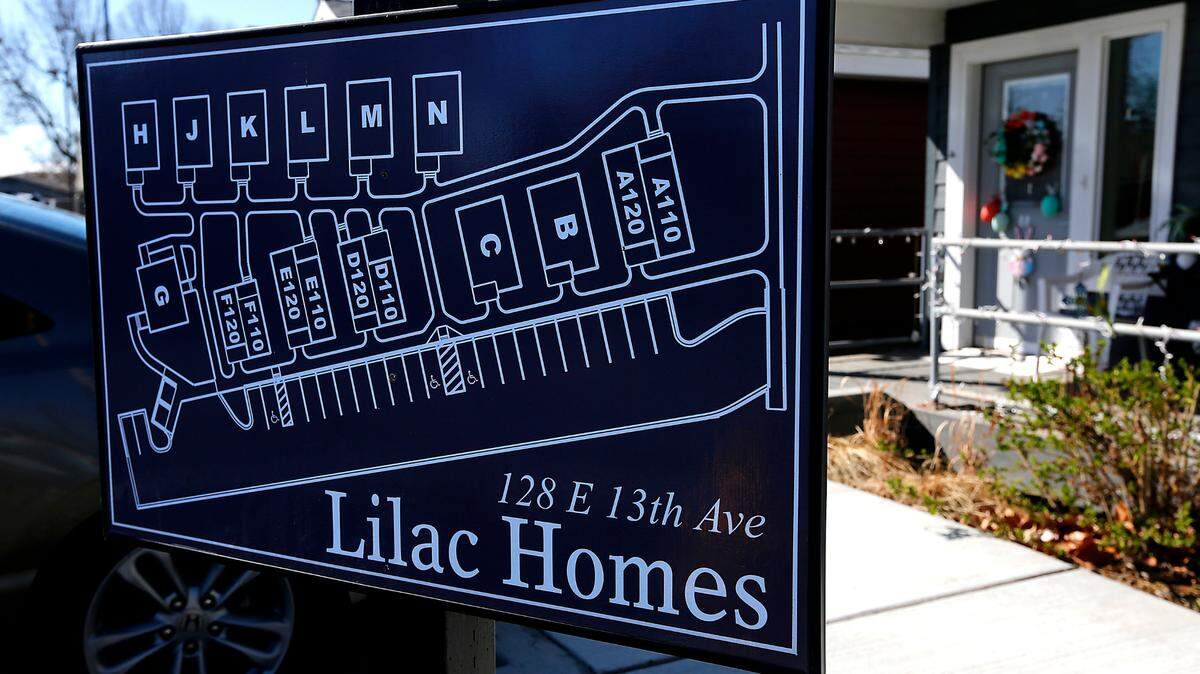A sign posted at the Lilac Homes development on East 13th Avenue in Kennewick maps out the placement of units at the micro house project.
