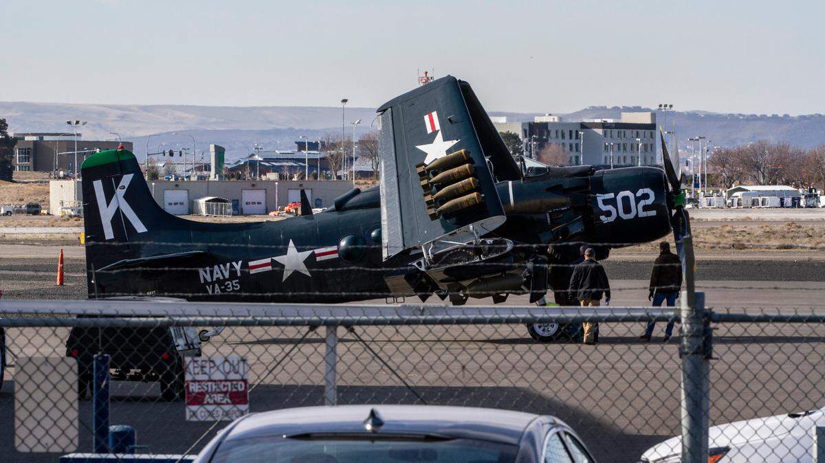 Planes featured in Devotion, a Korean War epic, are housed in hangers near the Tri-Cities Airport in Pasco. Aerial scenes for the movie are being filmed above the Snake River near Burbank between Highway 12 and the Ice Harbor Dam.