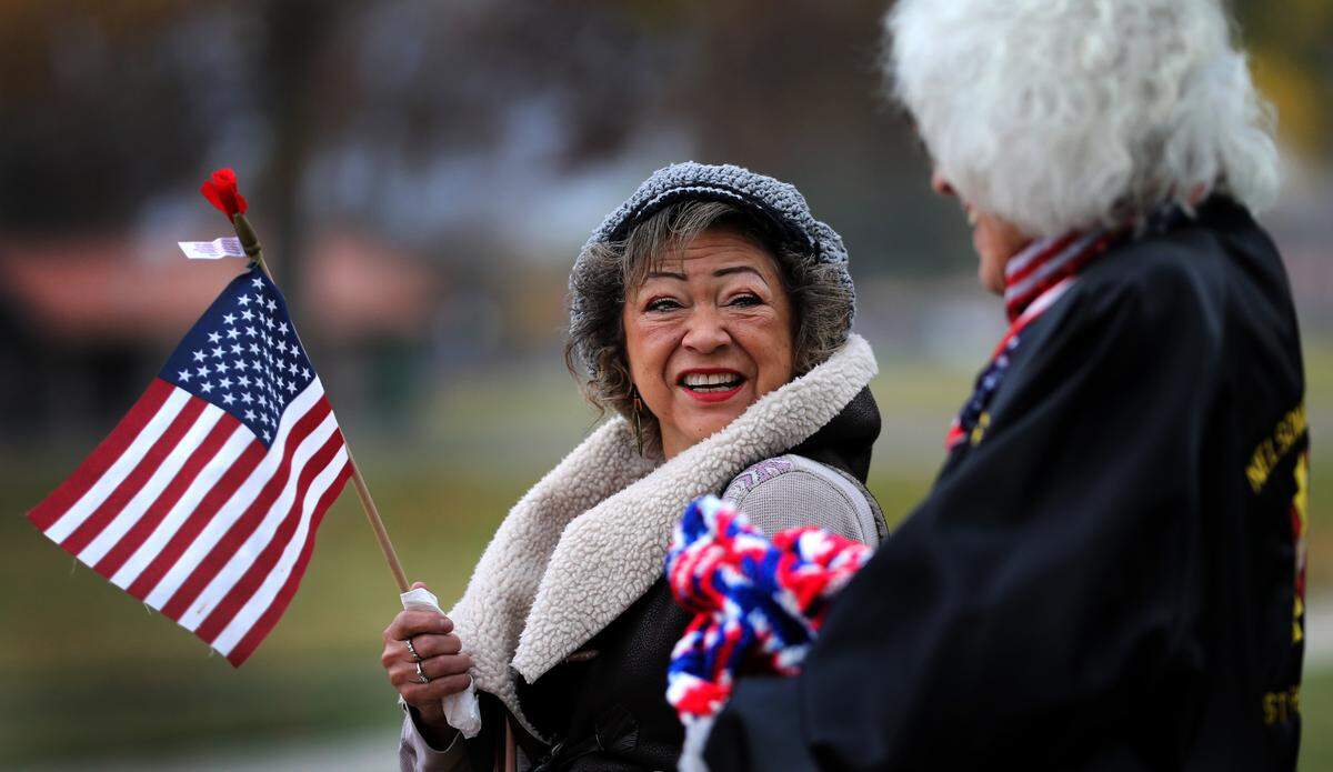 Minnie Zamora, left, and Gold Star mother Shirley Schmunk of Richland attend Monday’s Veterans Day ceremony in Kennewick’s Columbia Park.
