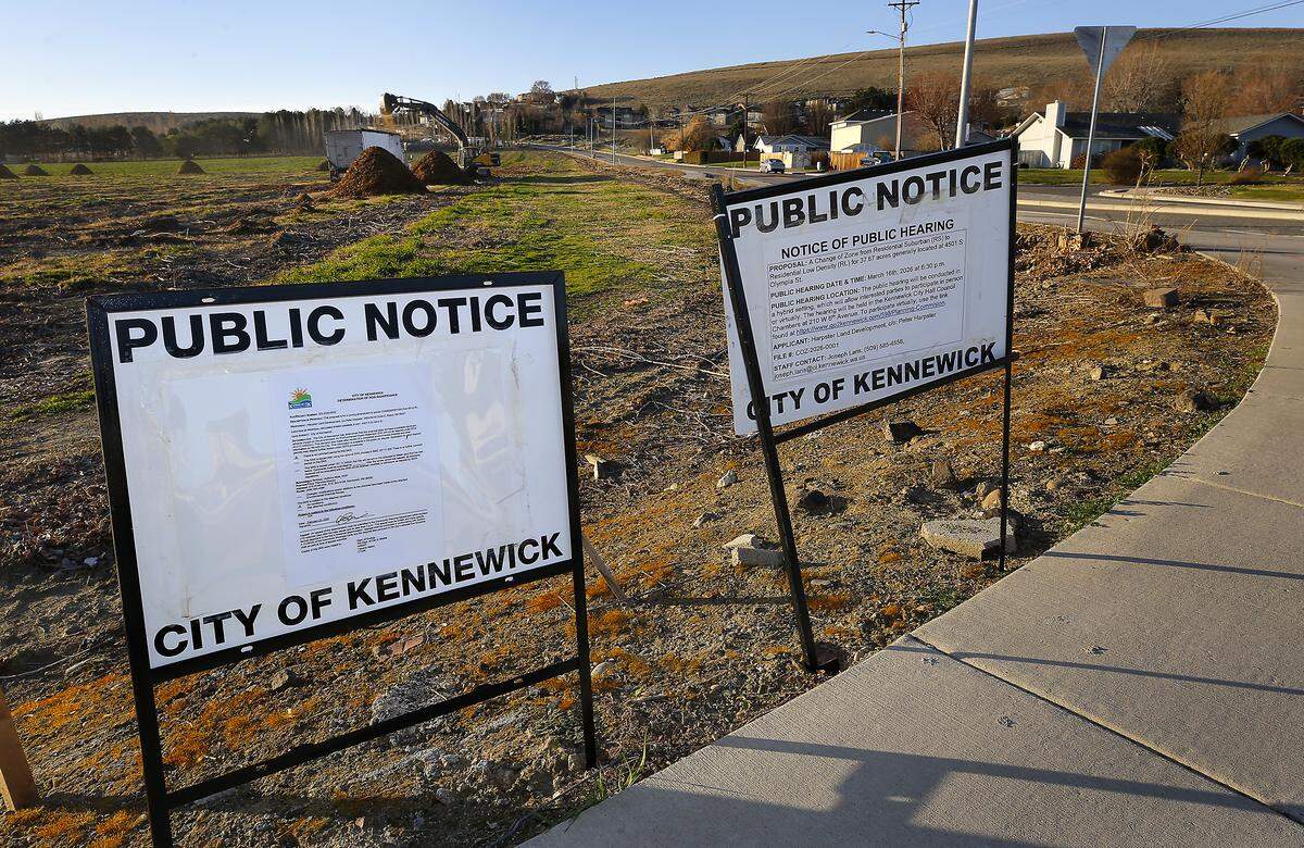 Official notices posted by the City of Kennewick announce a public hearing on March 16 about a change of zoning for nearly 38 acres at 4501 S. Olympia St. in Kenenwick. The proposal is to change from residential suburban to residential low density at the former orchard.