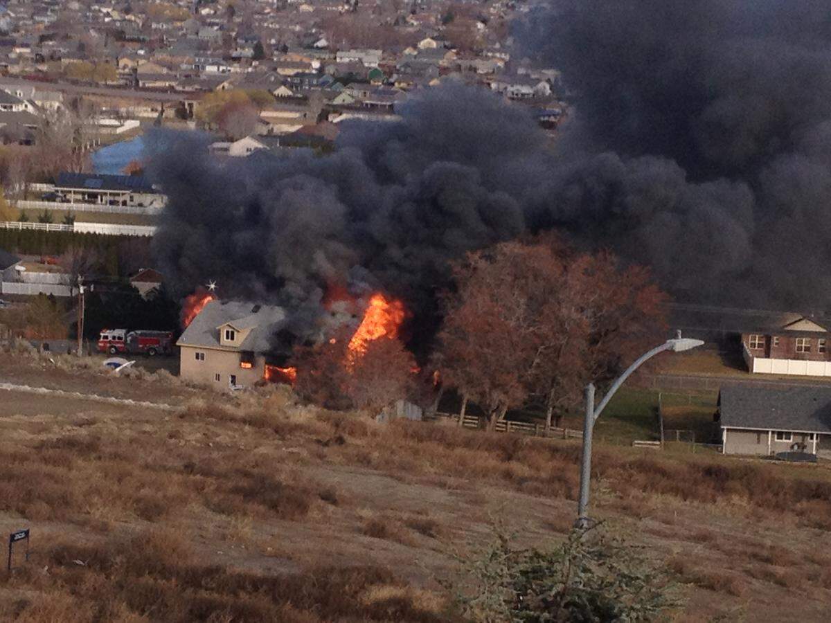 A house on the edge of West Richland was ravaged by fire Monday morning on the 5600 block of Lattin Road. Benton County Fire District 4 crews were getting help for other fire departments.