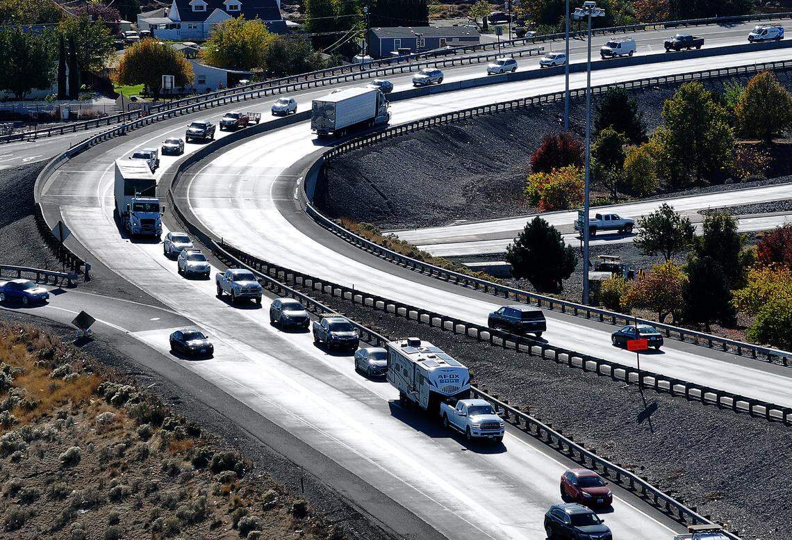 Traffic converges into one lane in the northbound ramps of Highway 395 to the blue bridge during the $33.5 million painting project of the span over the Columbia River.
