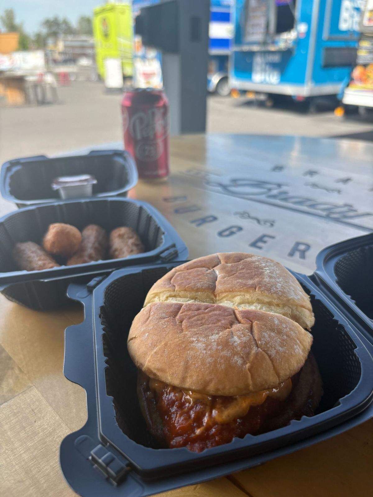 The spicy chicken sandwich and mozzarella sticks from Gray’s Wings and Things food truck at the Summer’s Hub of Kennewick.