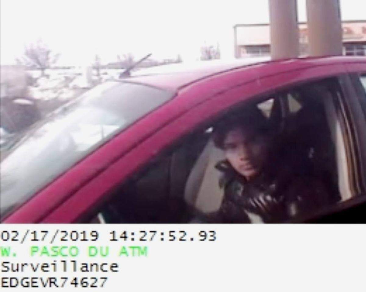 A possible third person was caught on camera as part of a investigation into people who used stolen debit cards to get thousands of dollars.