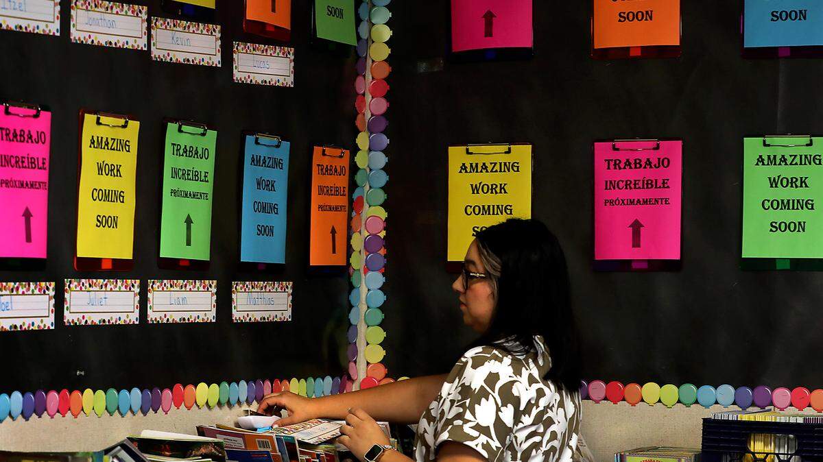 AUG. 2023 FILE PHOTO — Second grade teacher Anali Garibay organizes and prepares her classroom at Mark Twain Elementary School in Pasco for the upcoming start of the 2023-24 school year.