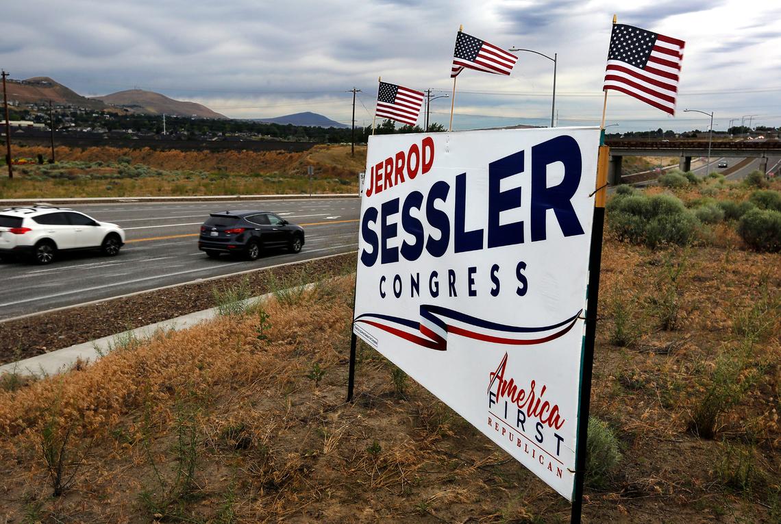 Traffic streams past a campaign sign for Jerrod Sessler near the intersection of Clearwater Avenue and Steptoe Street in west Kennewick.