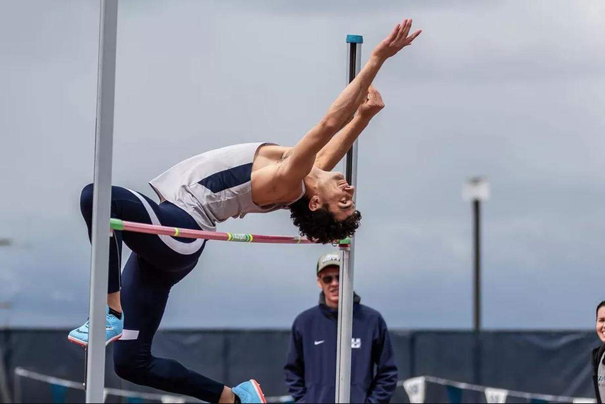Utah State track and field athlete Roman Ruiz competes on the high jump at the USU T&F Aggie Invitational in April 2019.