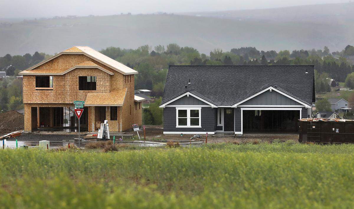 New houses under construction in the Peach Tree Estates housing development in south Richland.